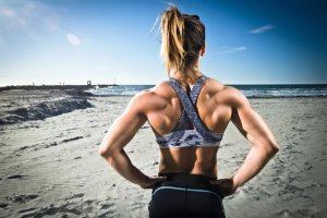 an-athletic-girl-standing-on-the-beach-646191463-5ae39de8119fa80036a594ae.jpg