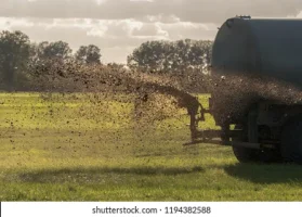 farm-tractor-sprays-manure-tanker-260nw-1194382588.jpg.webp