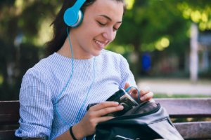 happy-girl-with-vintage-cassette-tape-player.jpg