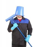 26101695-man-with-head-inside-of-bucket-isolated-on-a-white-background-.jpg